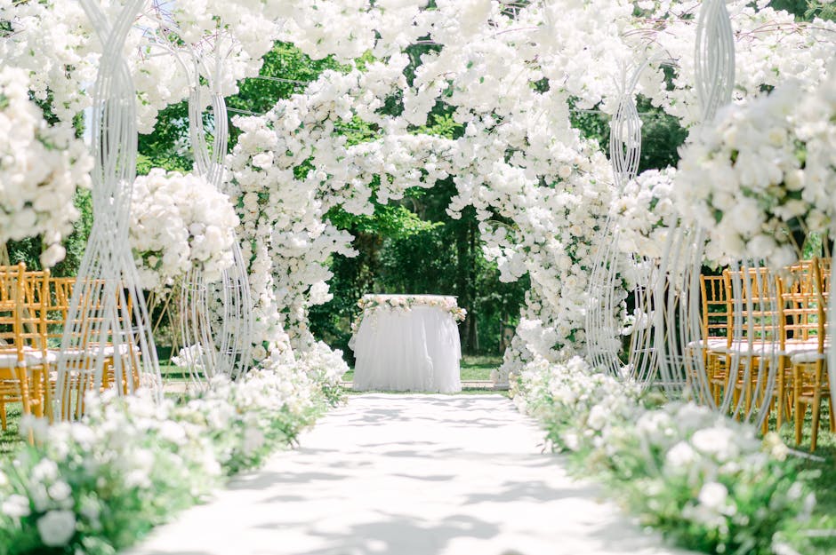 A lush garden ceremony space surrounded by wildflowers and open sky